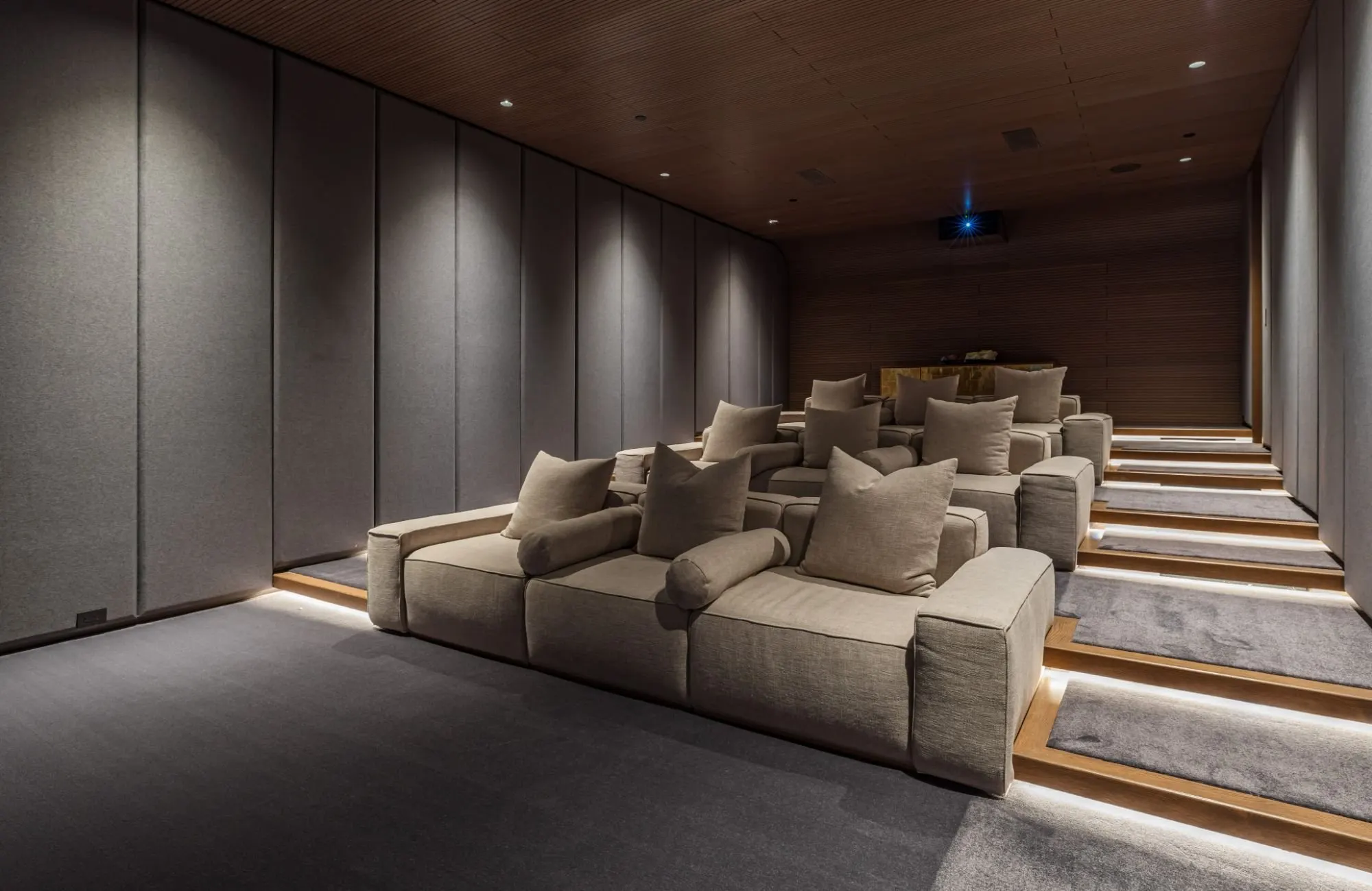 The Getty House — 684Firth Brentwood CA LA Home Theater Acoustic Panel Walls Tiered Seating Wood Ceiling  Modern Home