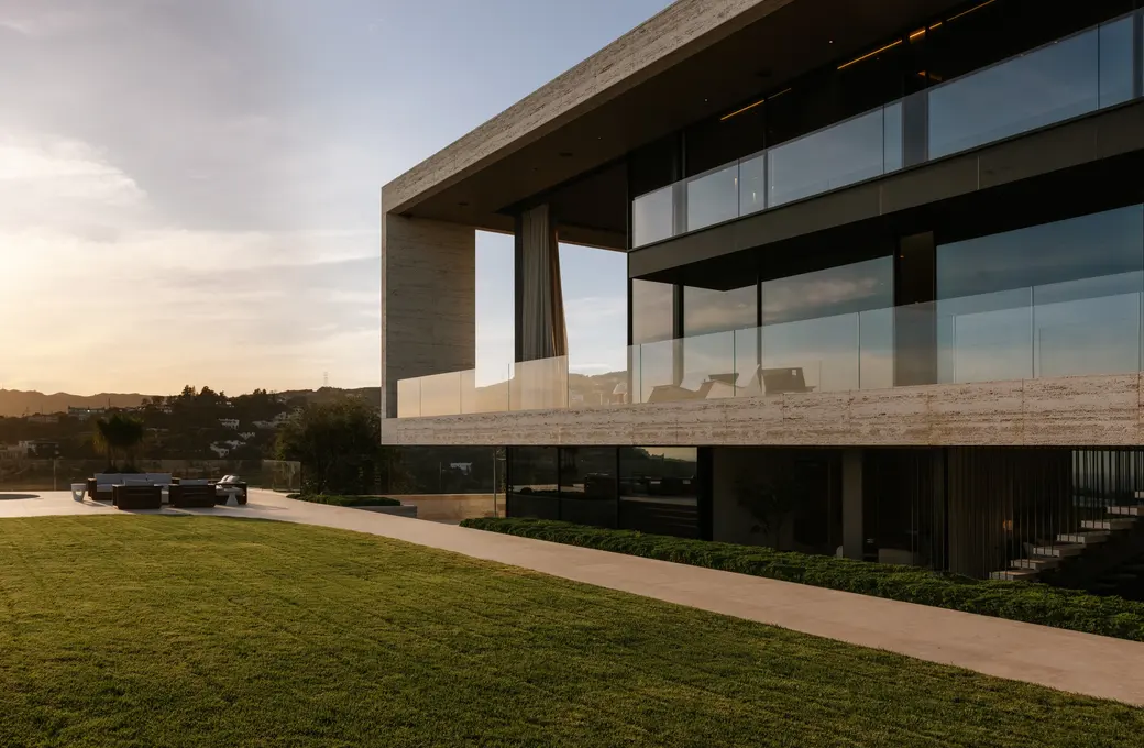 The Getty House rear elevation and lawn at golden hour