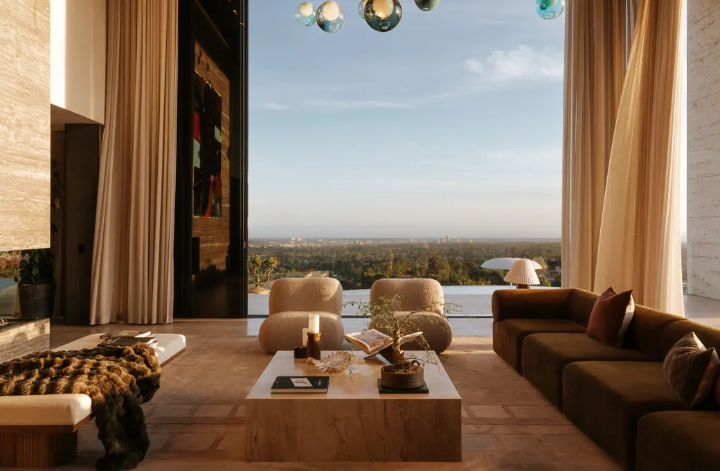 The Getty House great room with two-story glass over the city