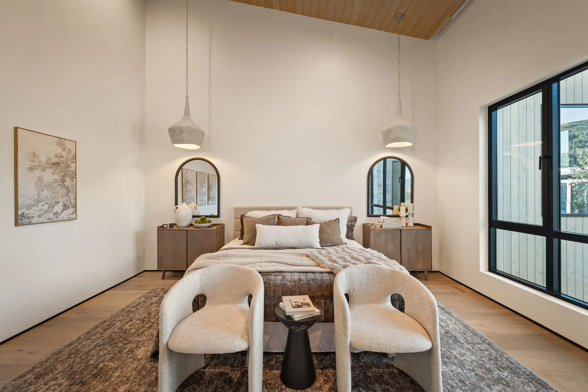 Lumen — bunk room with twin beds, arched mirrors and black-framed windows