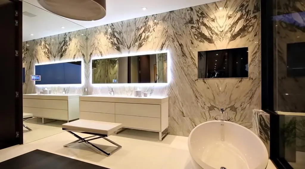 Stradella — marble primary bathroom, Bel Air estate by Roderick Builders