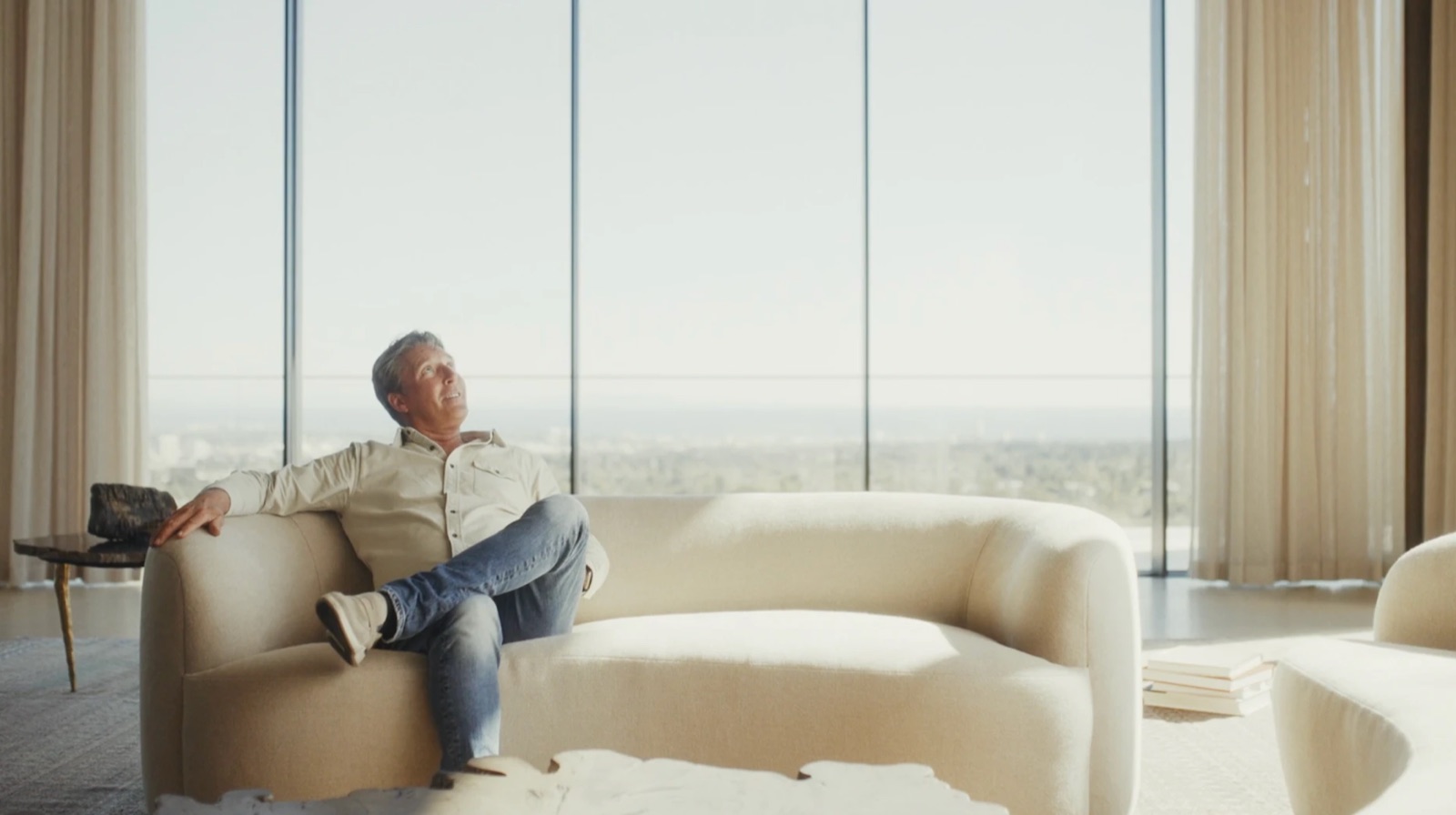 Travis Roderick in the great room of the Getty House, Brentwood, with Los Angeles beyond