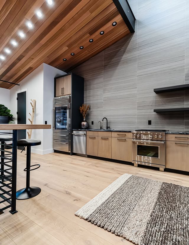 Kitchen craftsmanship — range hood and lighting details