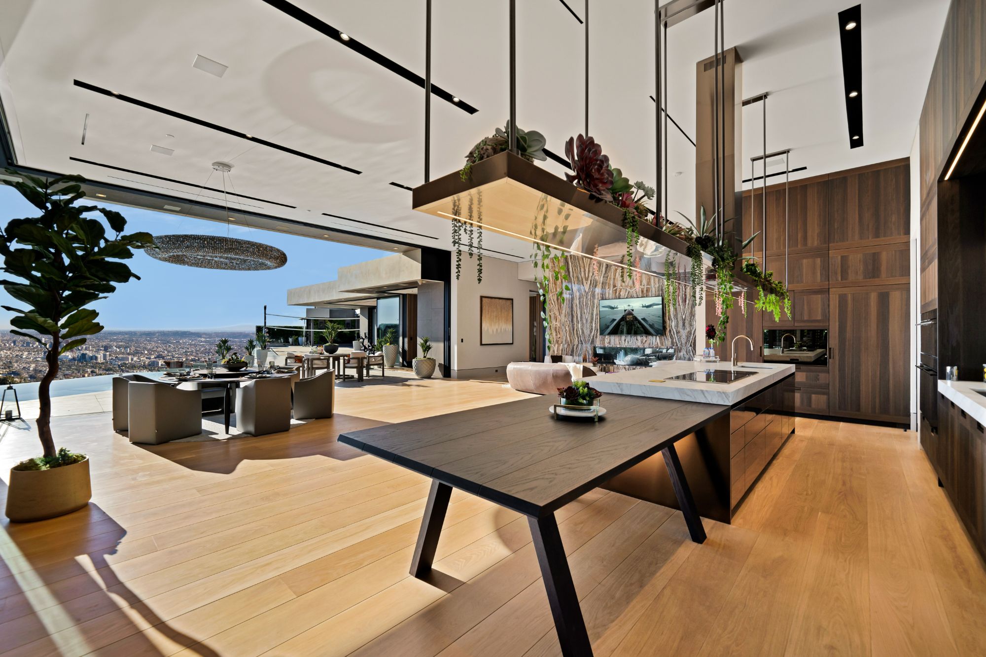 Flicker Estate — Arclinea kitchen with the hanging planted island and dining