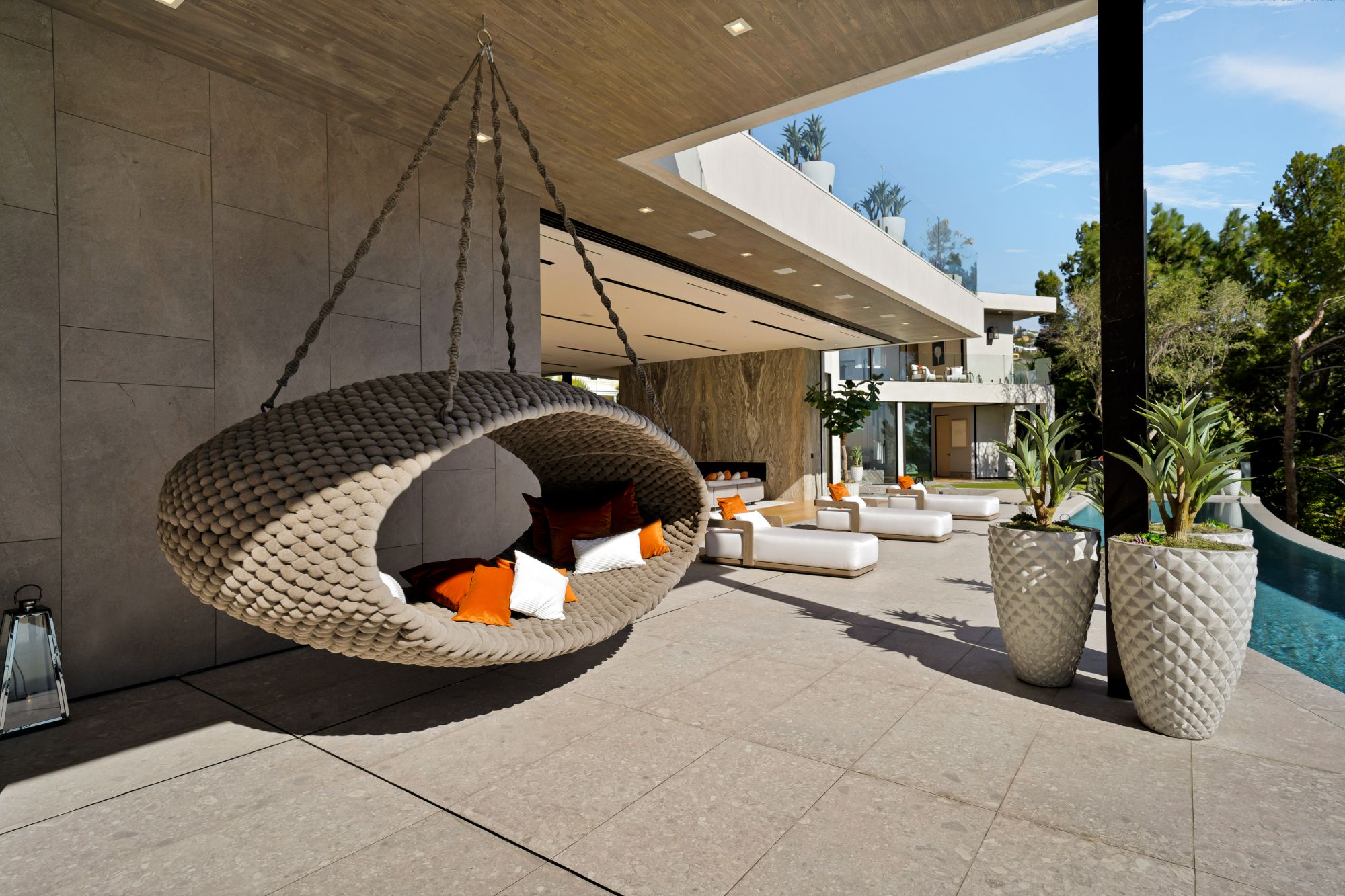 Flicker Estate — open terrace with hanging chair