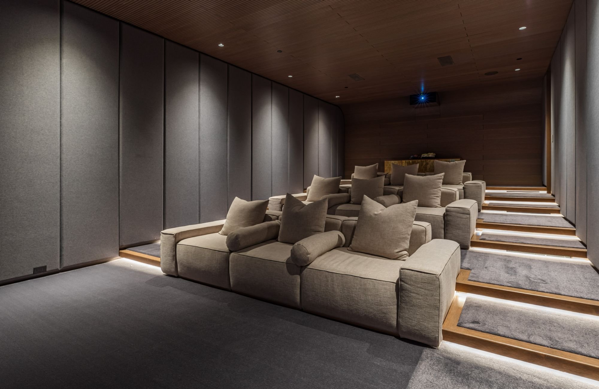 The Getty House — 684Firth Brentwood CA LA Home Theater Acoustic Panel Walls Tiered Seating Wood Ceiling  Modern Home