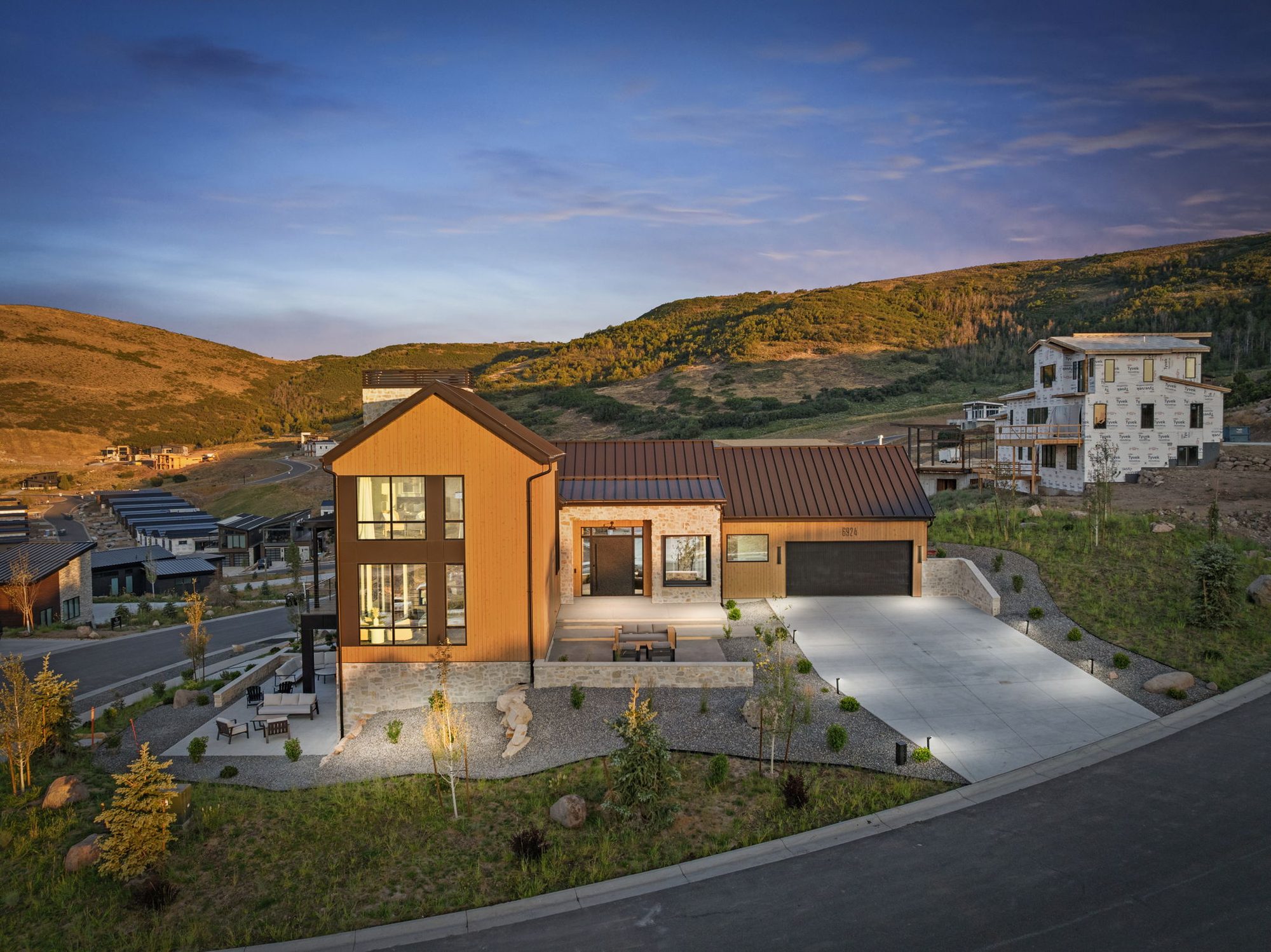 Lumen by Roderick Builders at blue hour — the mountain-modern standard we bring to Promontory